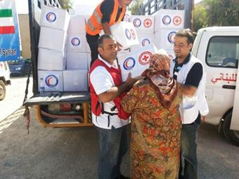 توزيع مساعدات كويتية على النازحين السوريين في لبنان